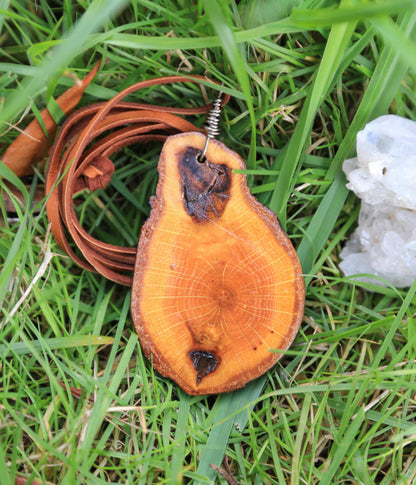 large wood slice necklaces hung from silk or leather / festival fashion / statement piece / boho jewelry / bohemian style necklace / earthy