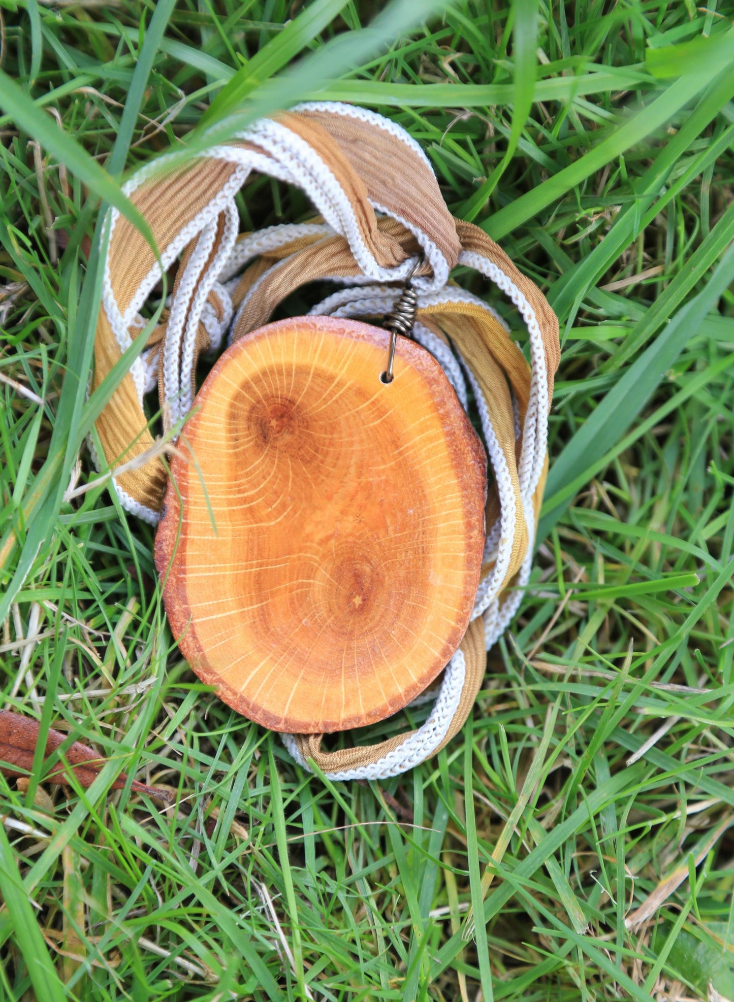 large wood slice necklaces hung from silk or leather / festival fashion / statement piece / boho jewelry / bohemian style necklace / earthy
