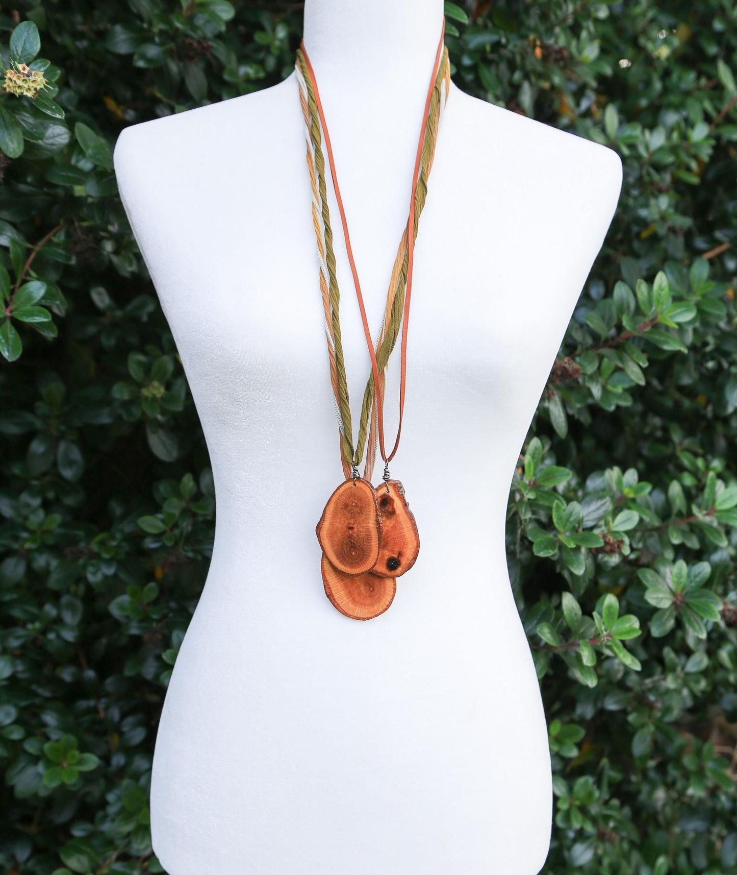 large wood slice necklaces hung from silk or leather / festival fashion / statement piece / boho jewelry / bohemian style necklace / earthy