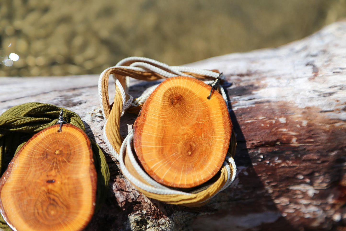 large wood slice necklaces hung from silk or leather / festival fashion / statement piece / boho jewelry / bohemian style necklace / earthy