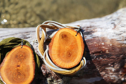 large wood slice necklaces hung from silk or leather / festival fashion / statement piece / boho jewelry / bohemian style necklace / earthy