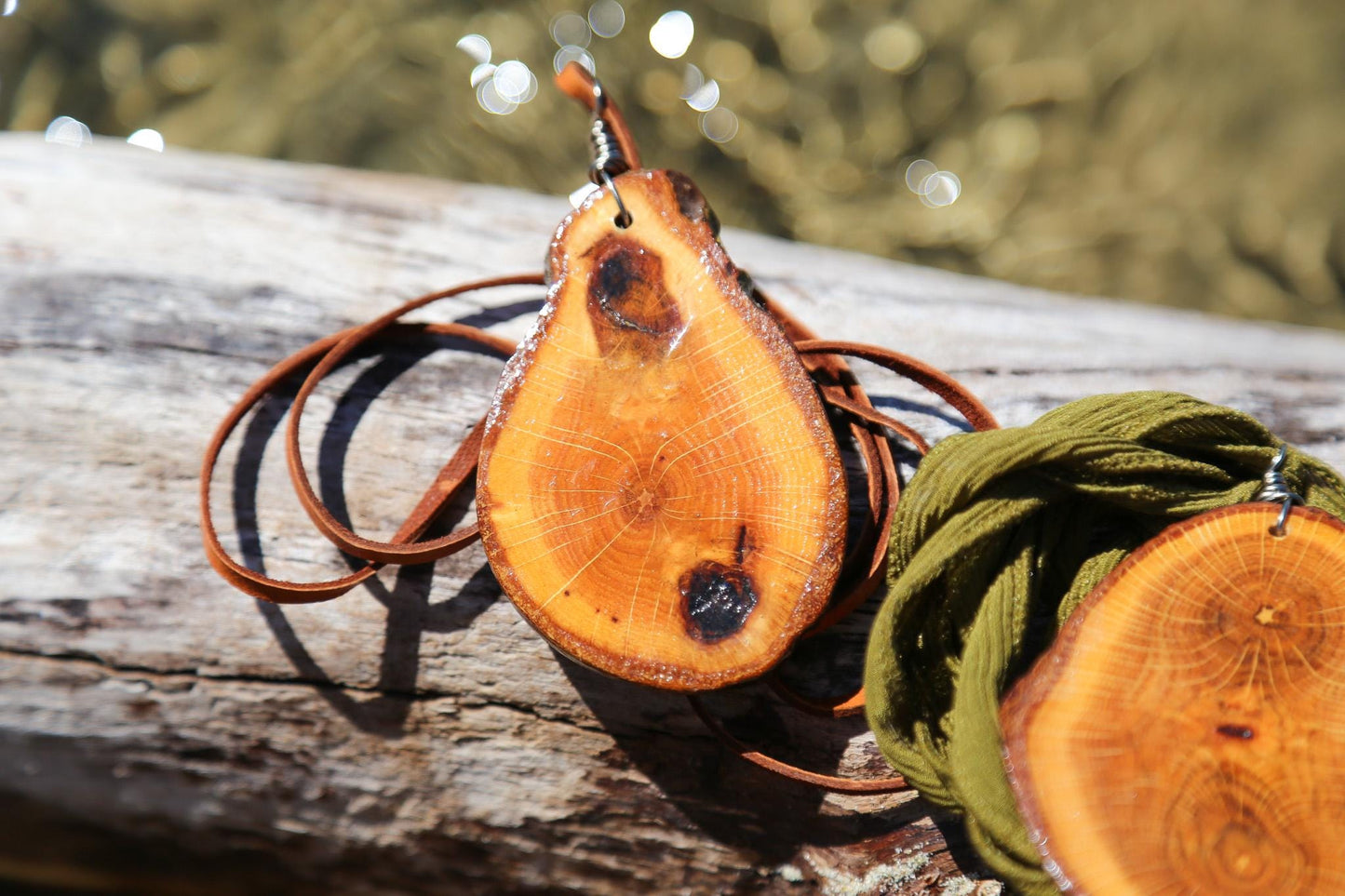 large wood slice necklaces hung from silk or leather / festival fashion / statement piece / boho jewelry / bohemian style necklace / earthy